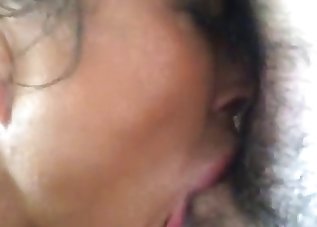 Busty brunette sensually sucks a big boner